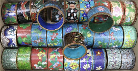 A collection of cloisonne napkin rings,